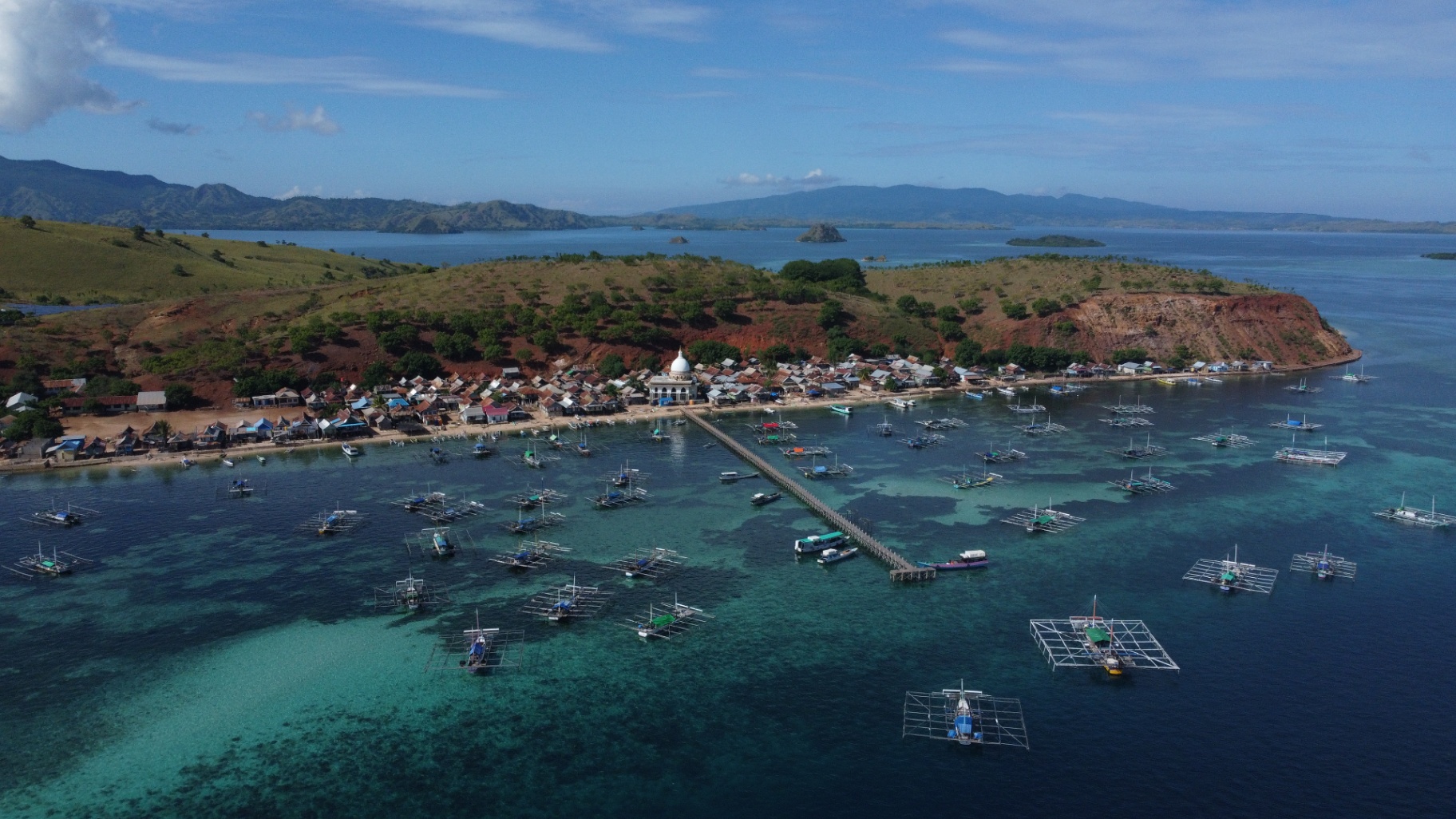 Augustine Phinisi yacht anchored near Pink Beach Komodo